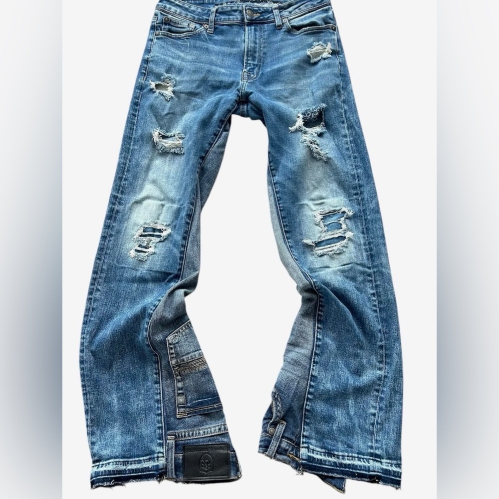 Relaxed Blue Distressed Jeans with Vintage Wash